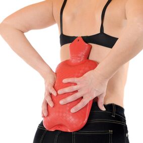 Wärmen Sie Ihren unteren Rücken gegen Schmerzen